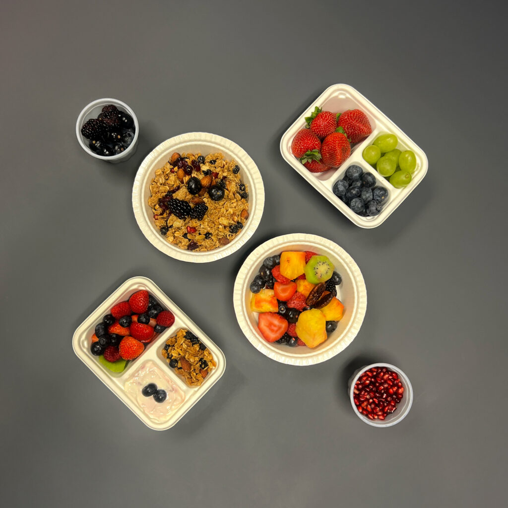 Healthy foods served with PPG's sustainable and compostable food trays